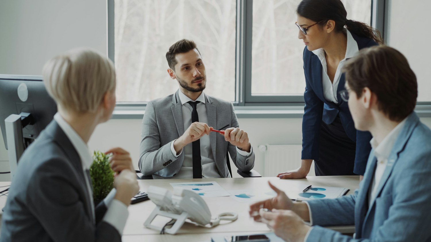 A leadership team working through a plan