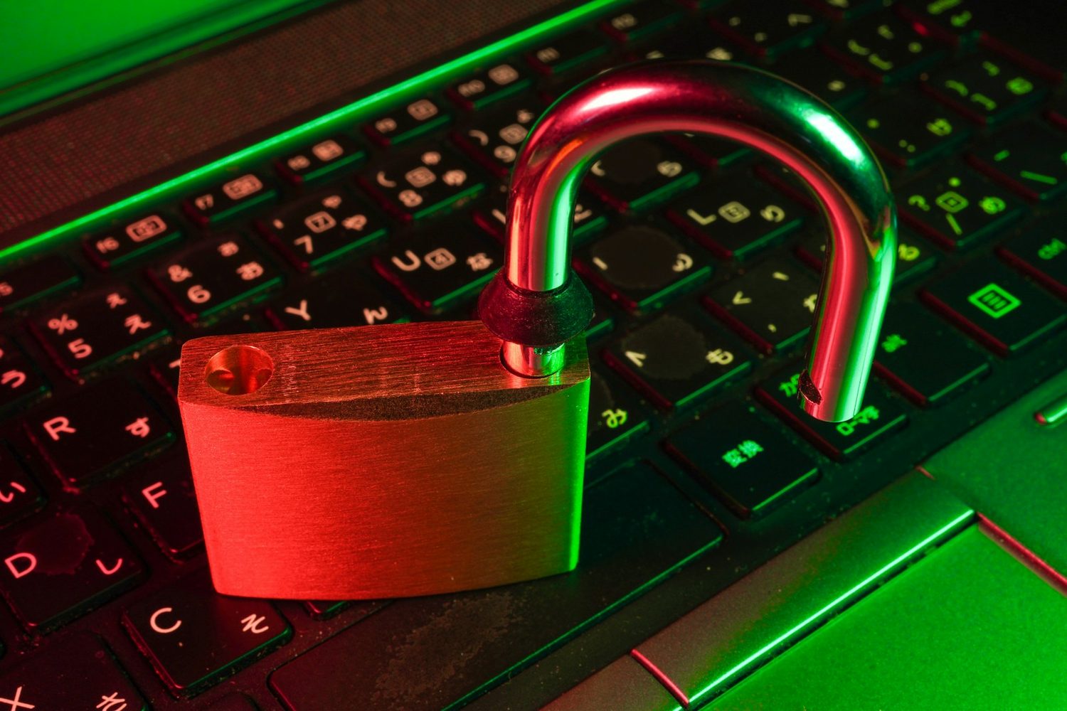 A padlock resting on a backlit keyboard