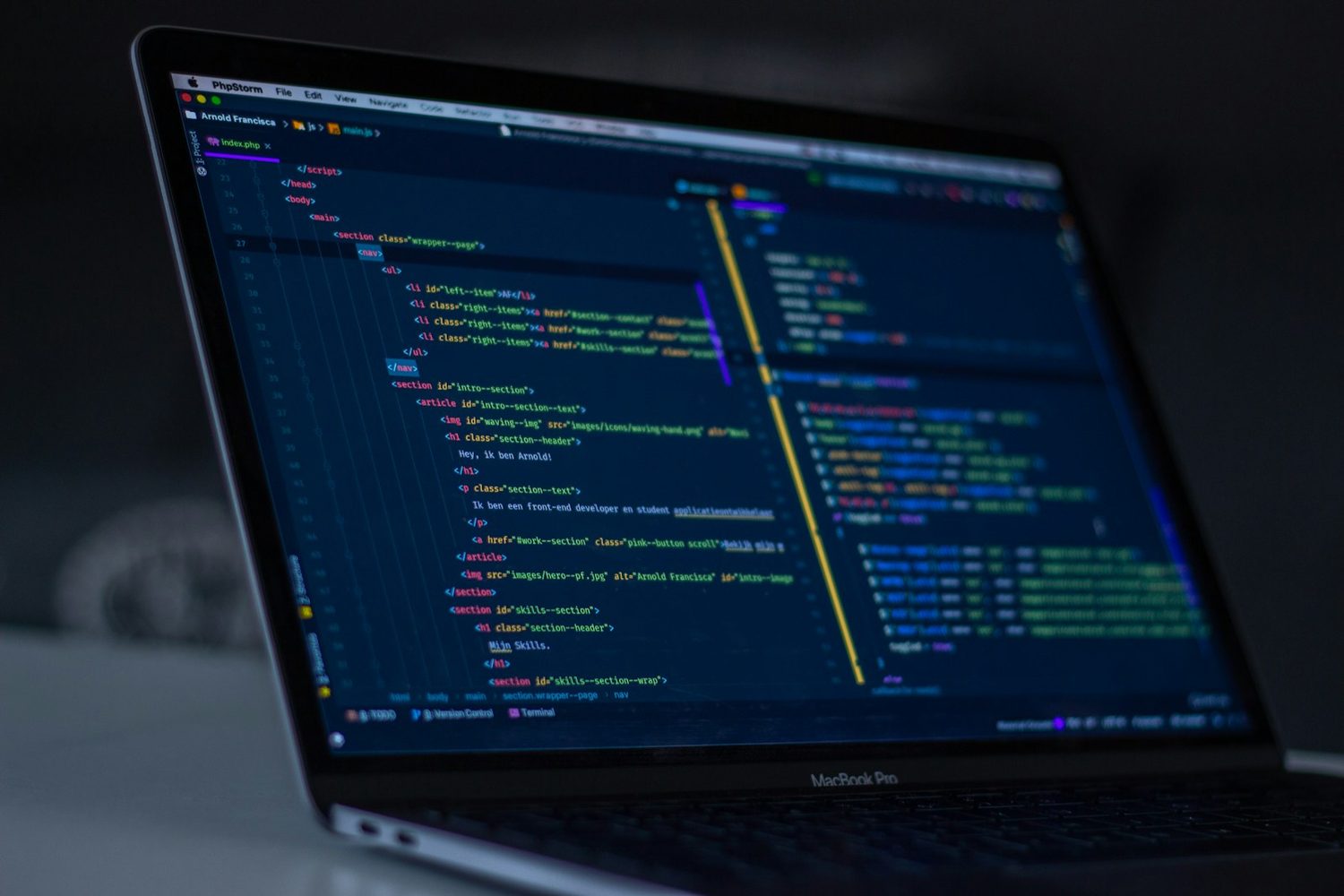 Application code open on a laptop during a build
